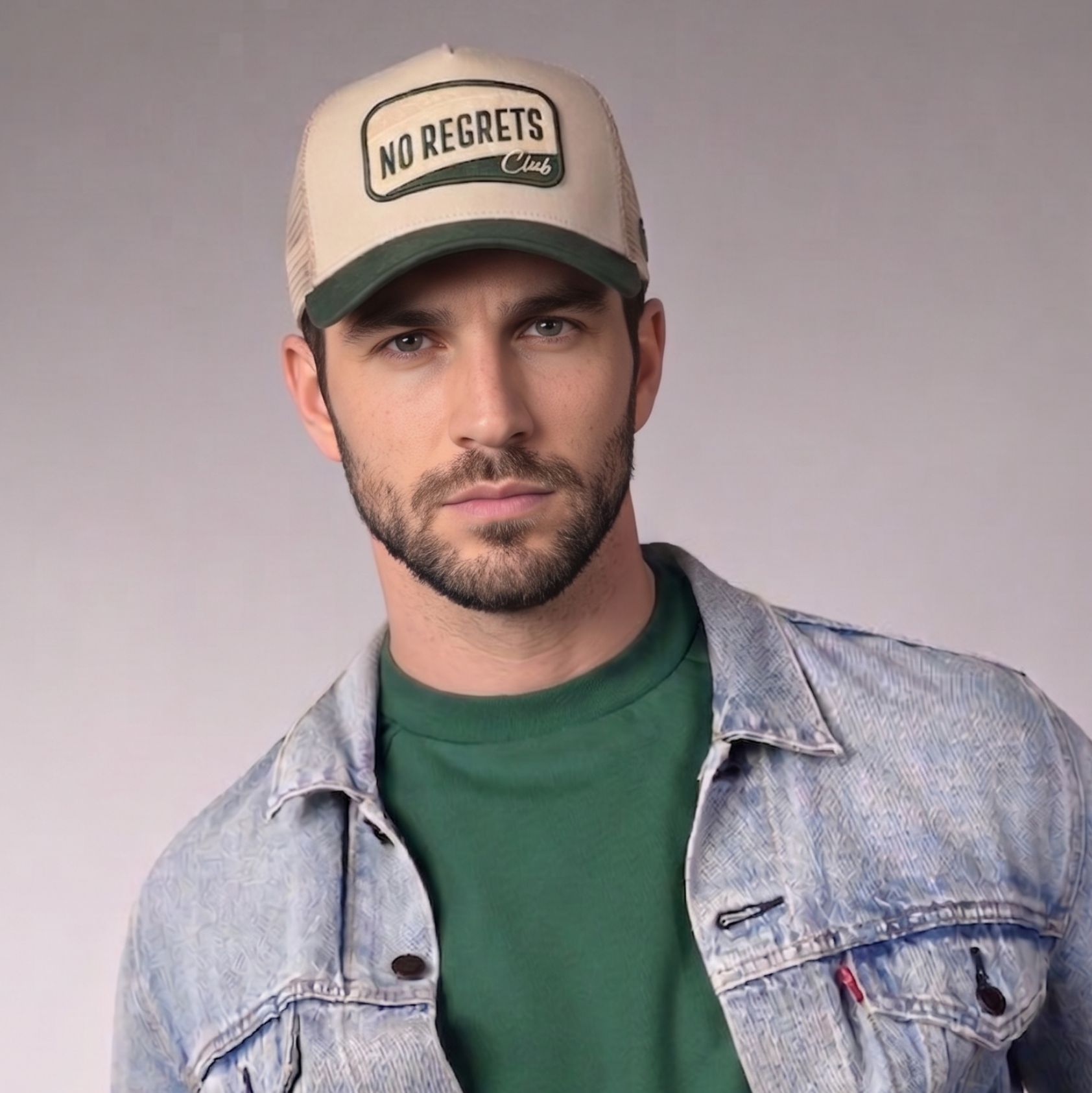 No Regrets Trucker Cap by Sand and Camels - model wearing the cap